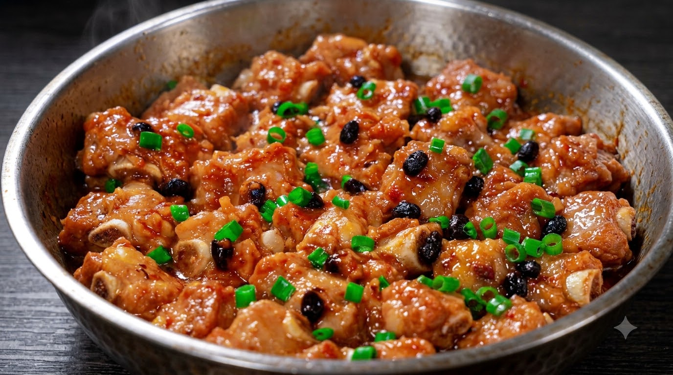 Costine di Maiale al Vapore Asciutto con Fagioli Neri e Aglio